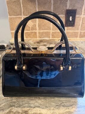 Black Patent Satchel Handbag with Gold Accents